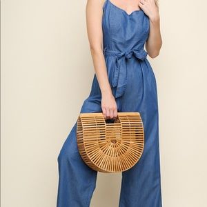 The Charos Closet medium denim jumpsuit